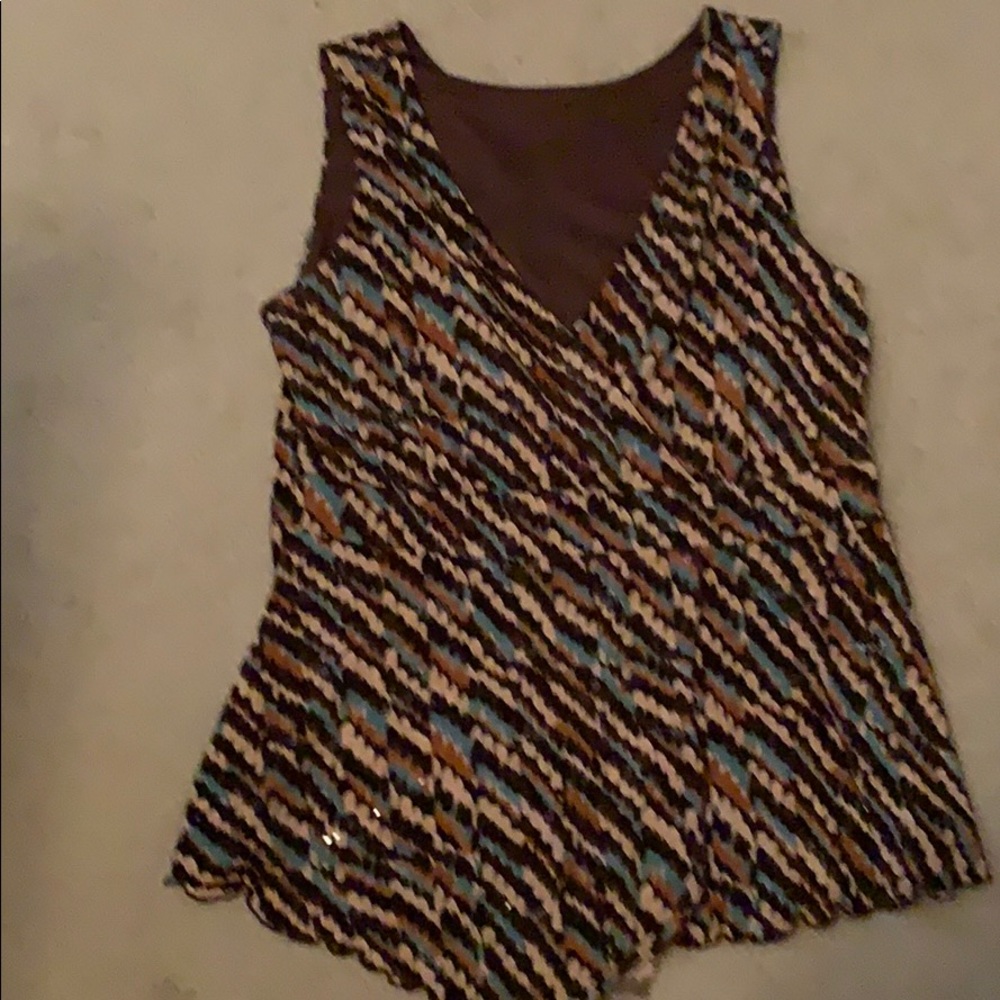 Blouse top to go with jean. Office or play time.